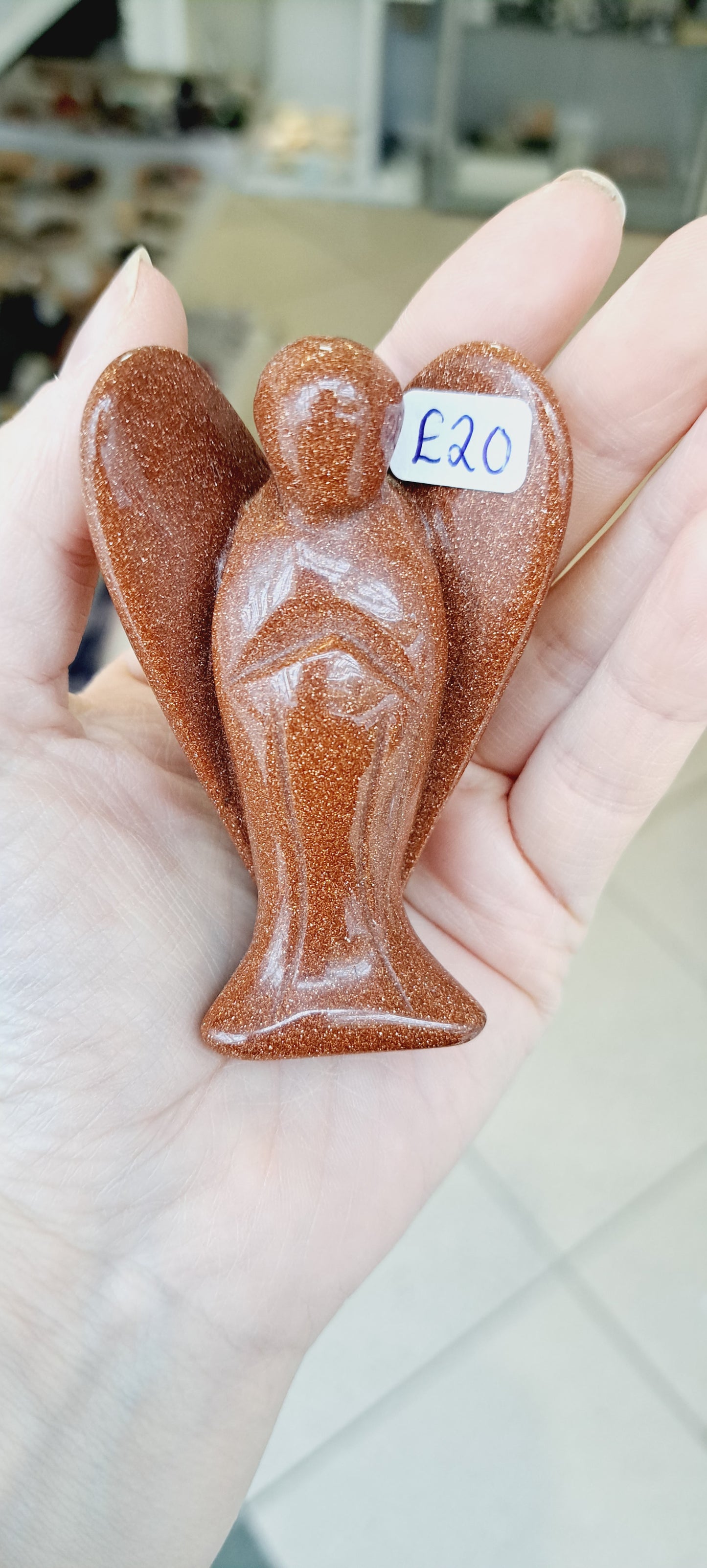 Red goldstone angel