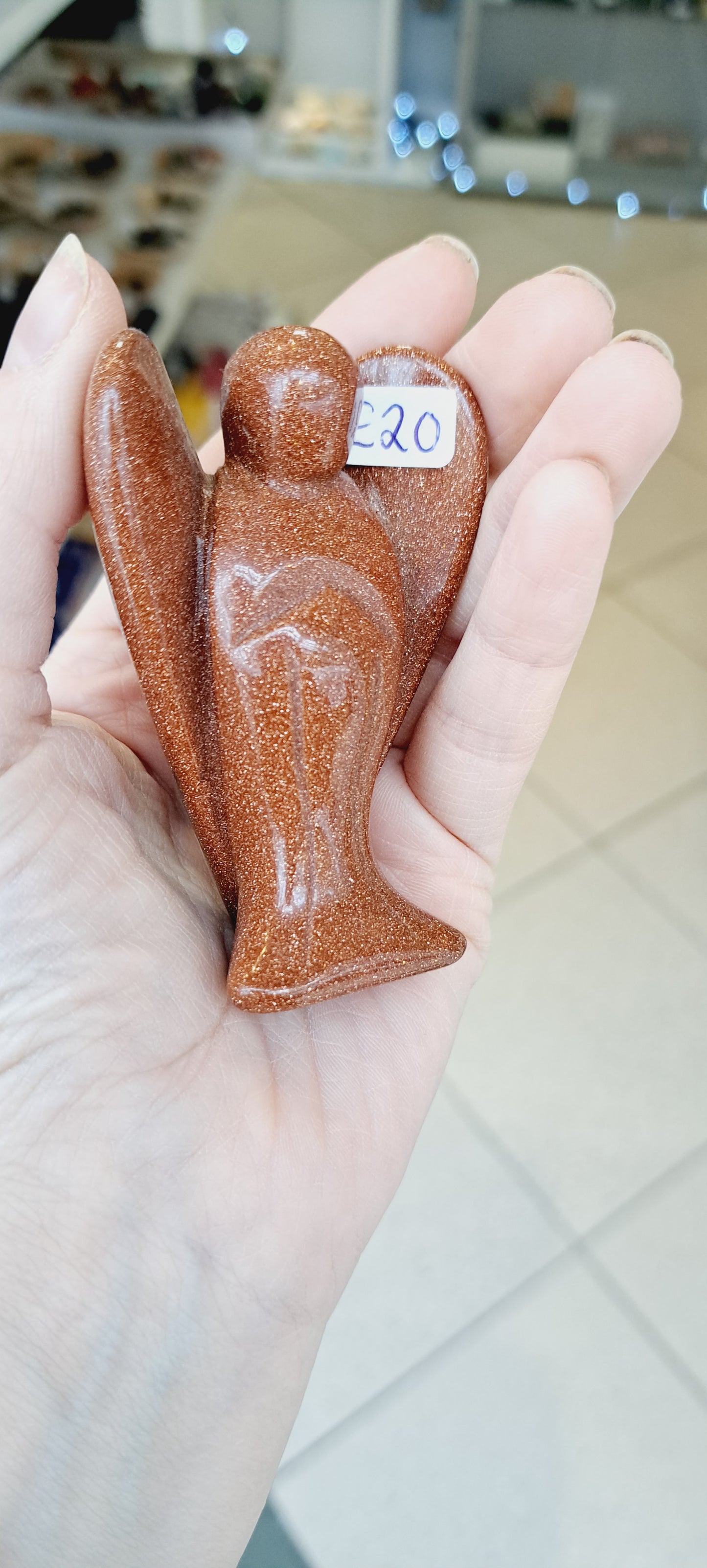 Red goldstone angel