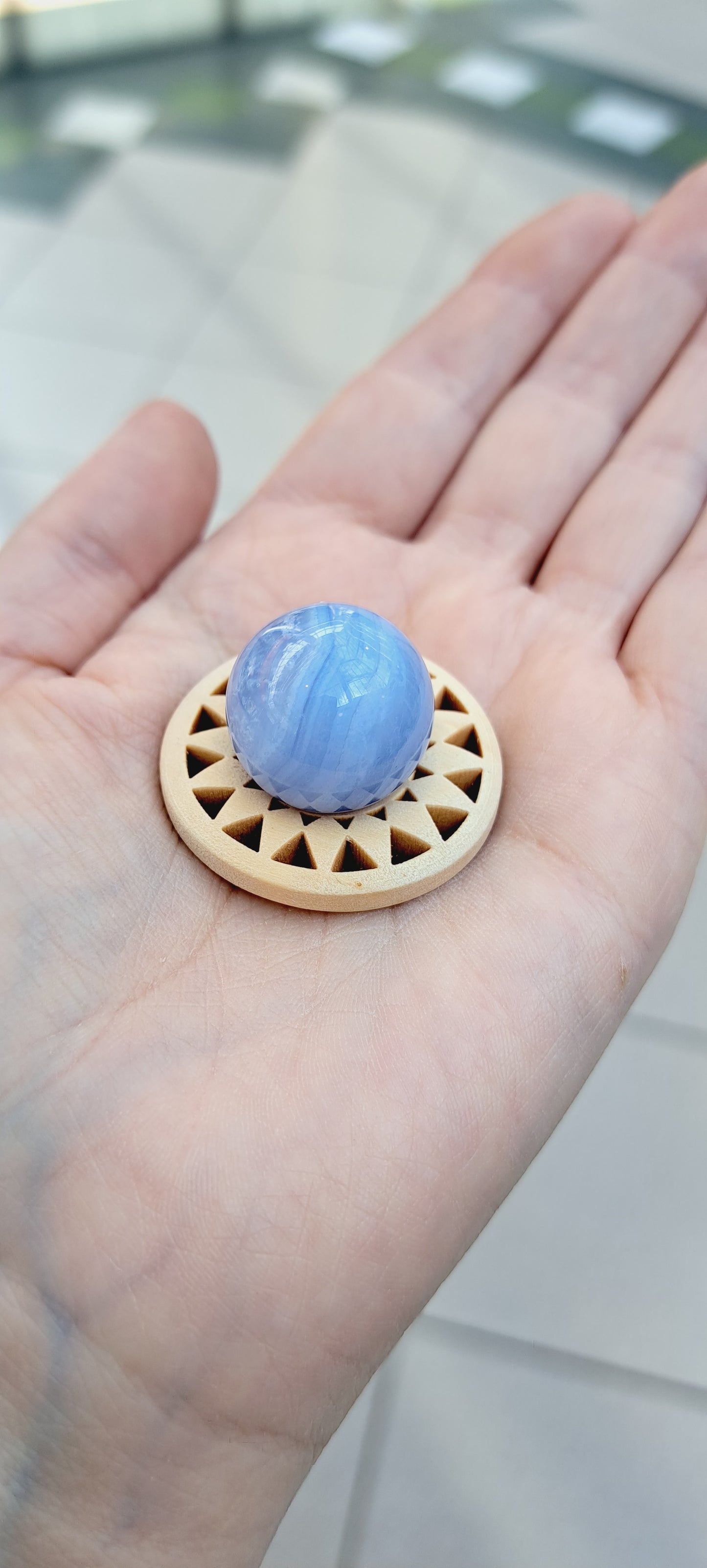 Blue lace sphere with wooden stand