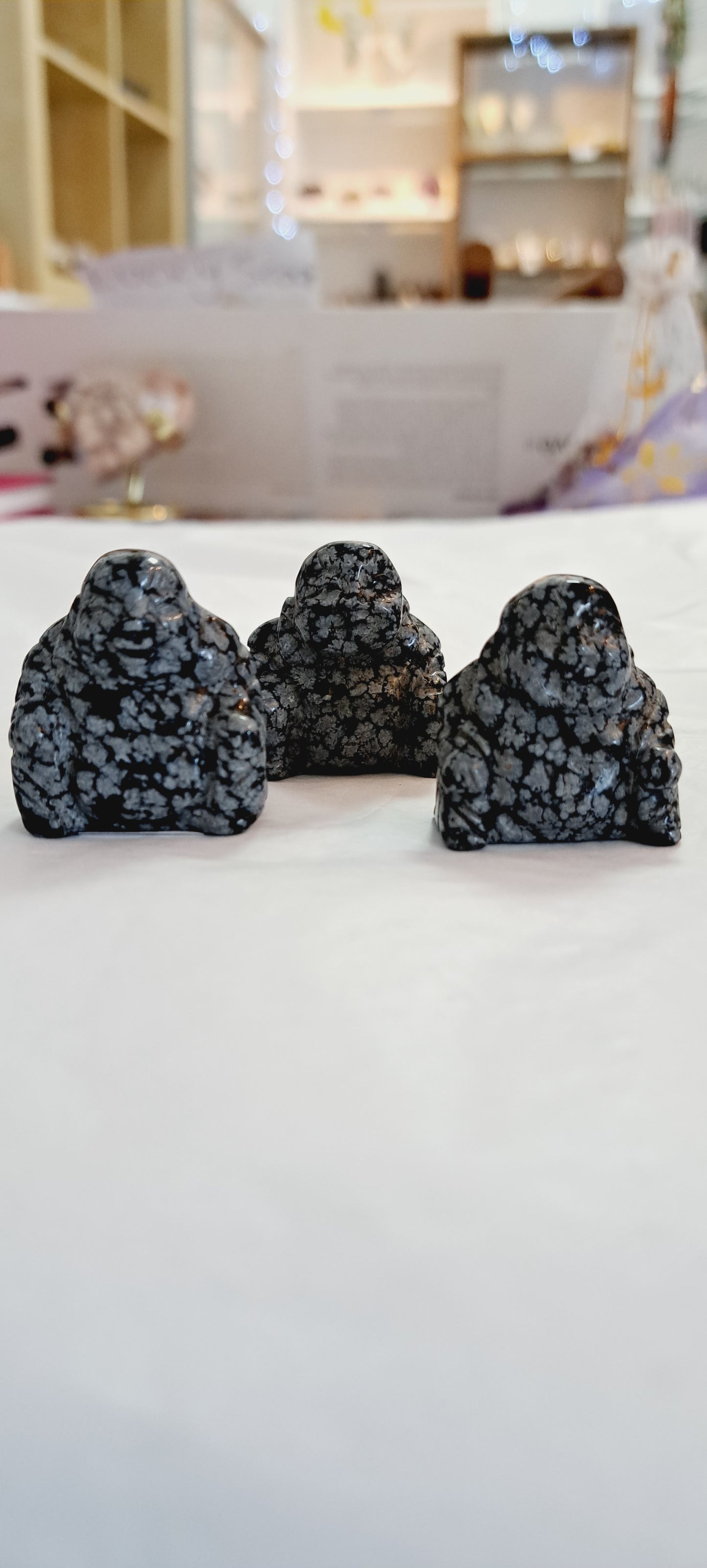 Snowflake obsidian budda