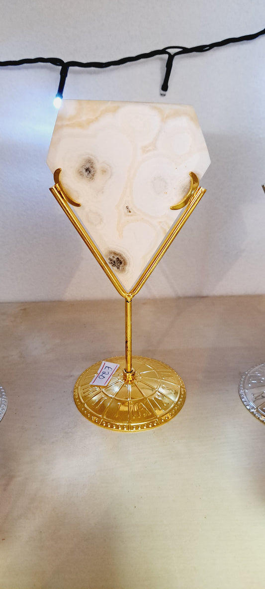 Large yellow calcite diamond on stand