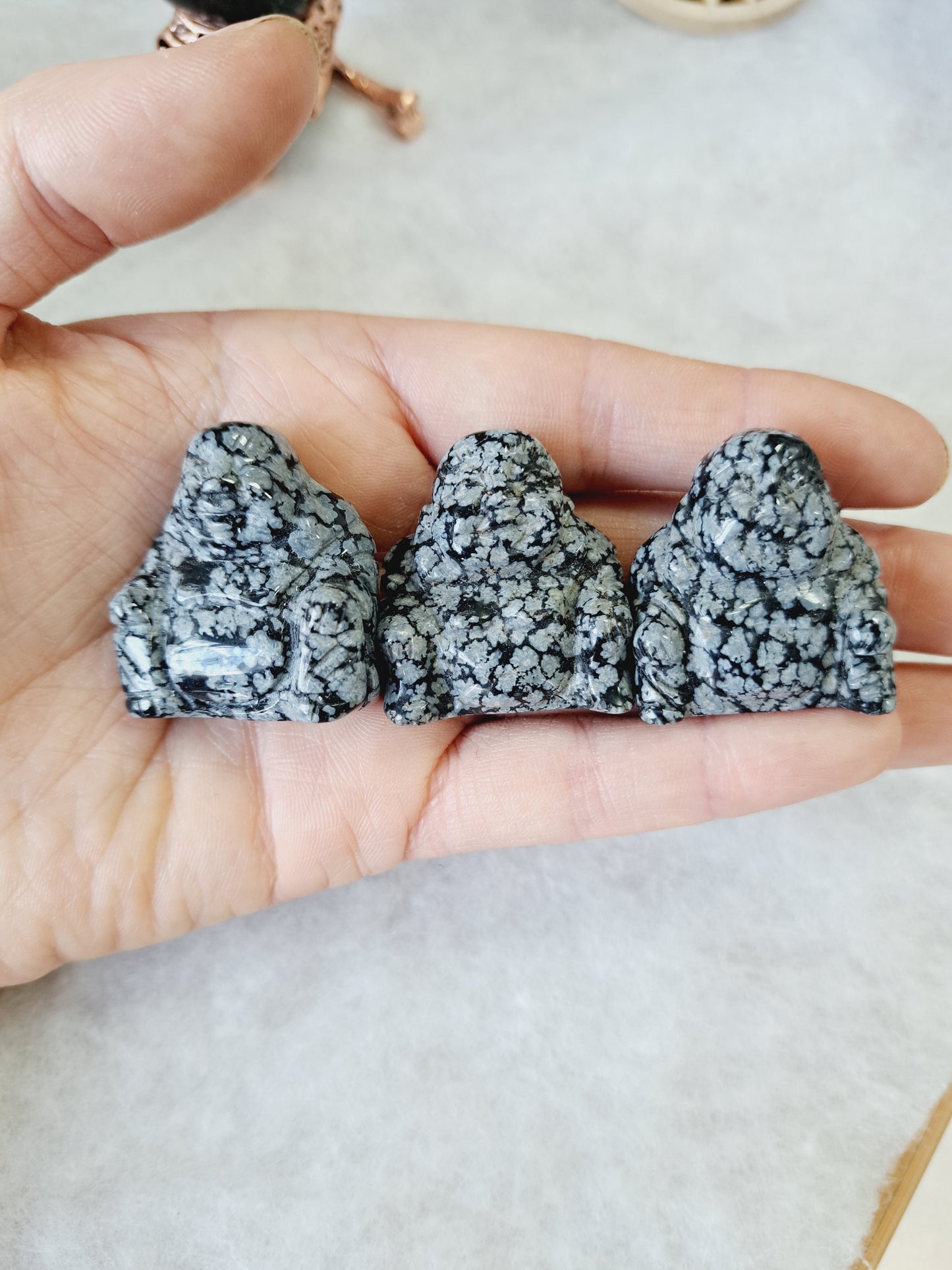 Snowflake obsidian budda