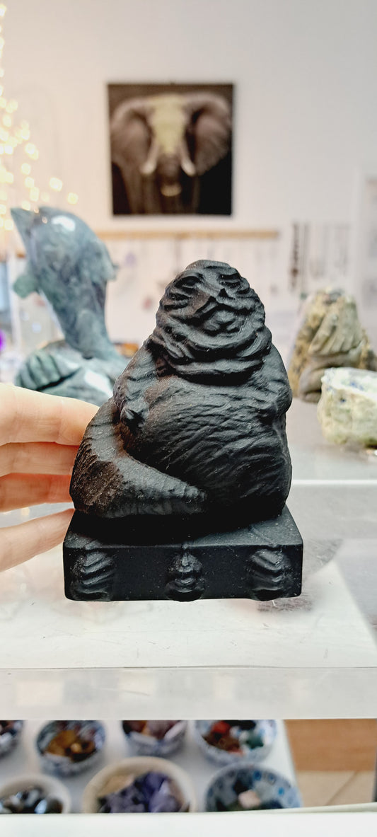 Large black obsidian jabba the hut