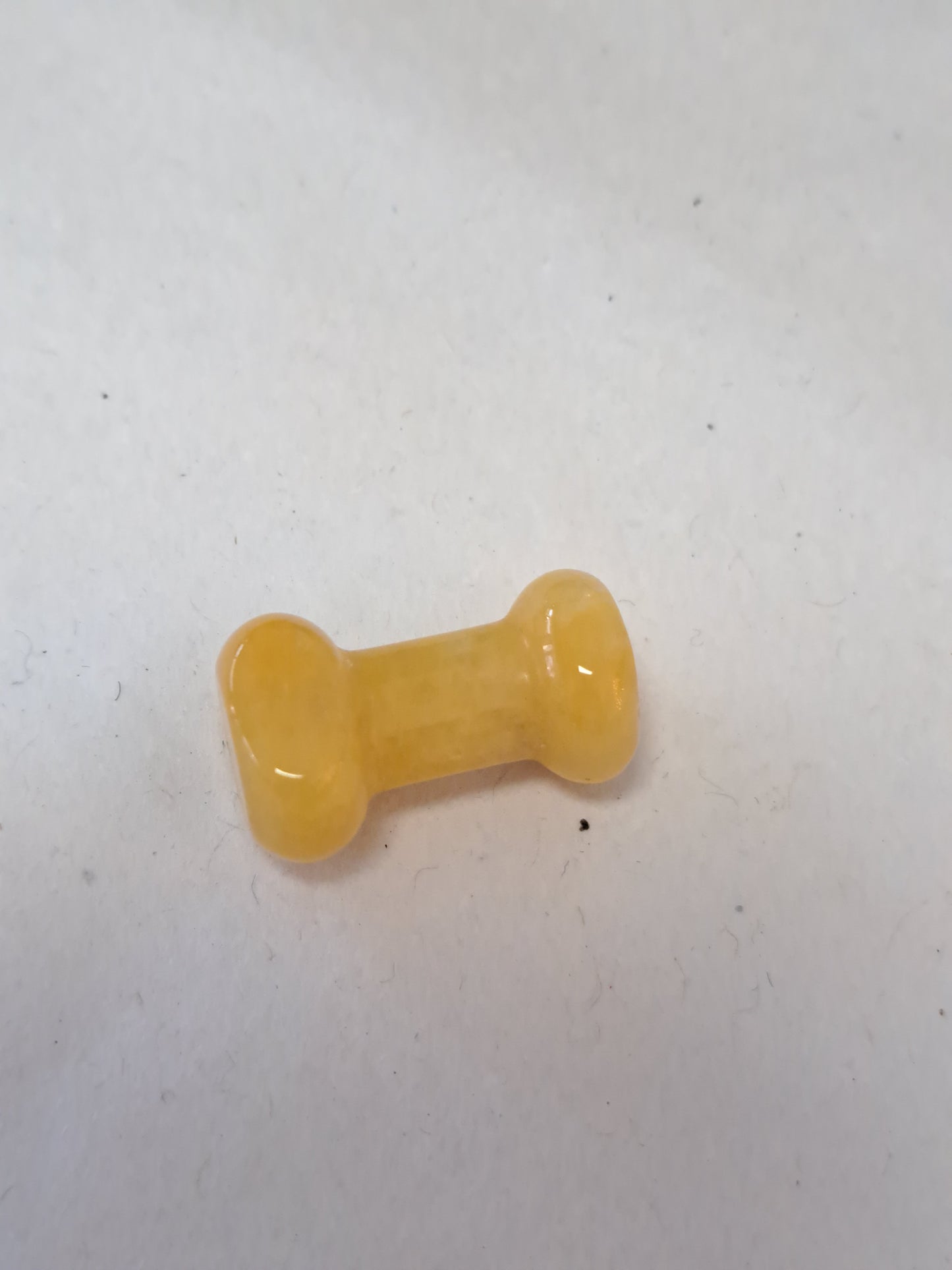 Yellow jade dog bone