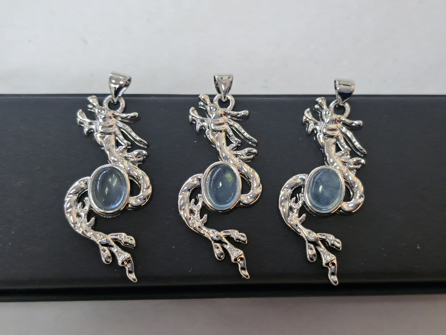 Aquamarine dragon pendant