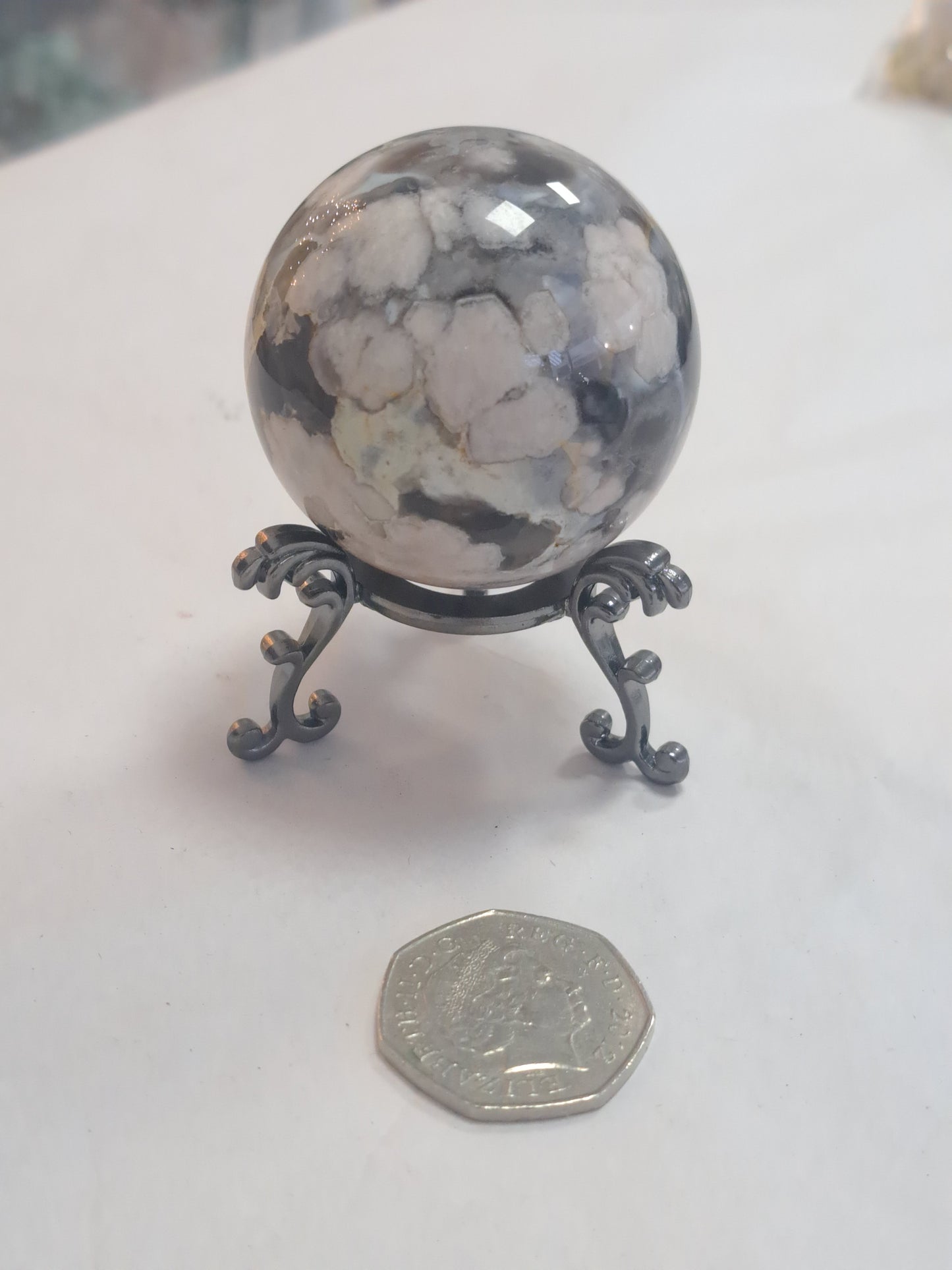 Black flower agate sphere