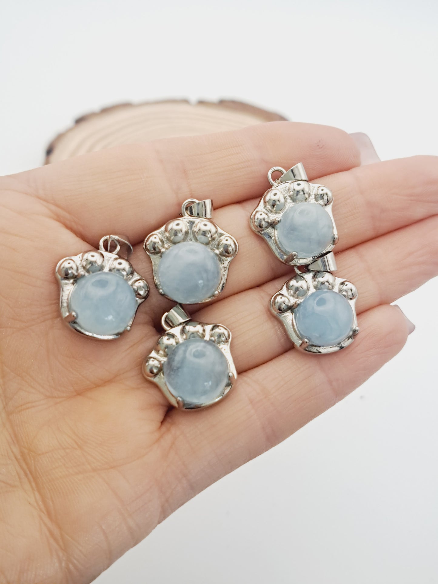 Aquamarine paw pendant