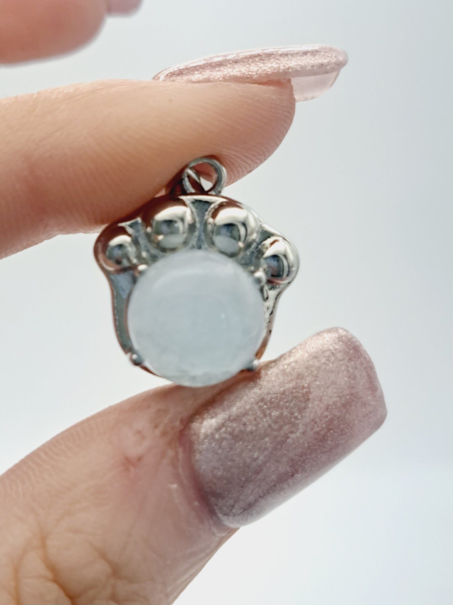 Aquamarine paw pendant