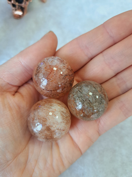 Large rutilated quartz sphere